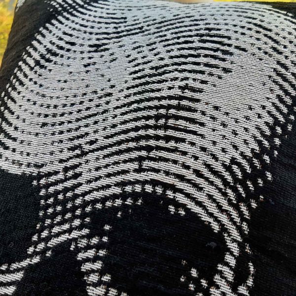 A close-up of the woven fabric finish on the Jolly Roger Cushion