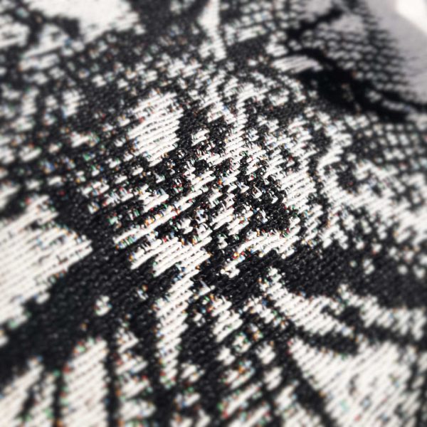 A detail image from the woven finish of the Cicada Cushion design